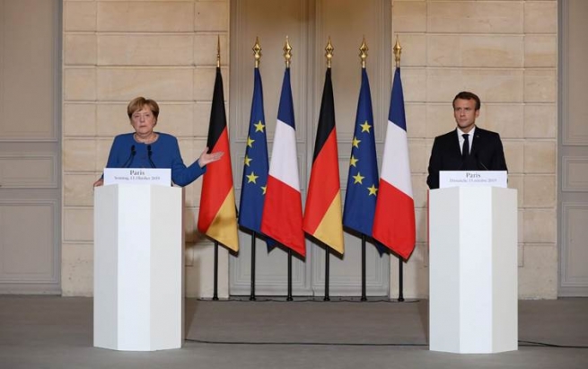 ماکرۆن و مێرکڵ: بە ئەردۆغانمان گوتووە دەبێت شەڕەکەی بوەستێنێت